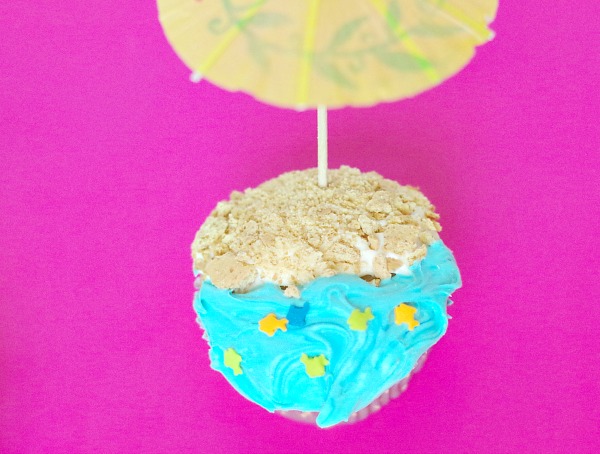 Kids are going to love making these beach themed cupcakes. They are the perfect dessert treat for a summer , beach or pool party and will look fantastic when displayed on the food table. The kids will enjoy making these cupcakes just as much as they will enjoy eating them. Have fun in the kitchen with this super easy to follow tutorial. Kids are going to love making these beach themed cupcakes. They are the perfect dessert treat for a summer , beach or pool party and will look fantastic when displayed on the food table. The kids will enjoy making these cupcakes just as much as they will enjoy eating them. Have fun in the kitchen with this super easy to follow tutorial.
