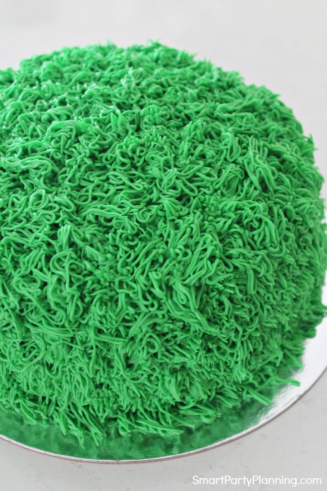 Monster cake covered in green fur Monster cake covered in green fur