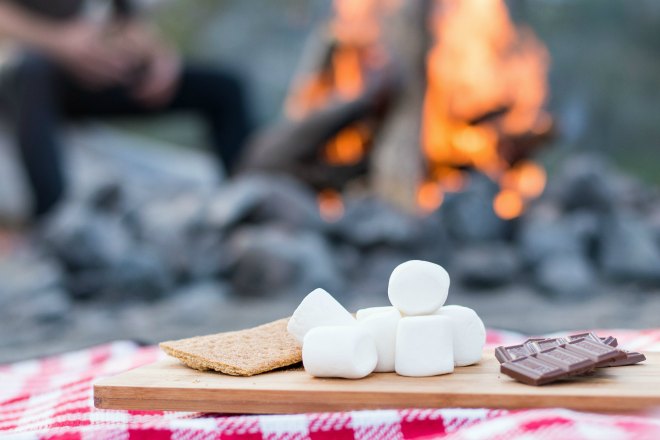 Cooking S'mores on the campfire Cooking S'mores on the campfire