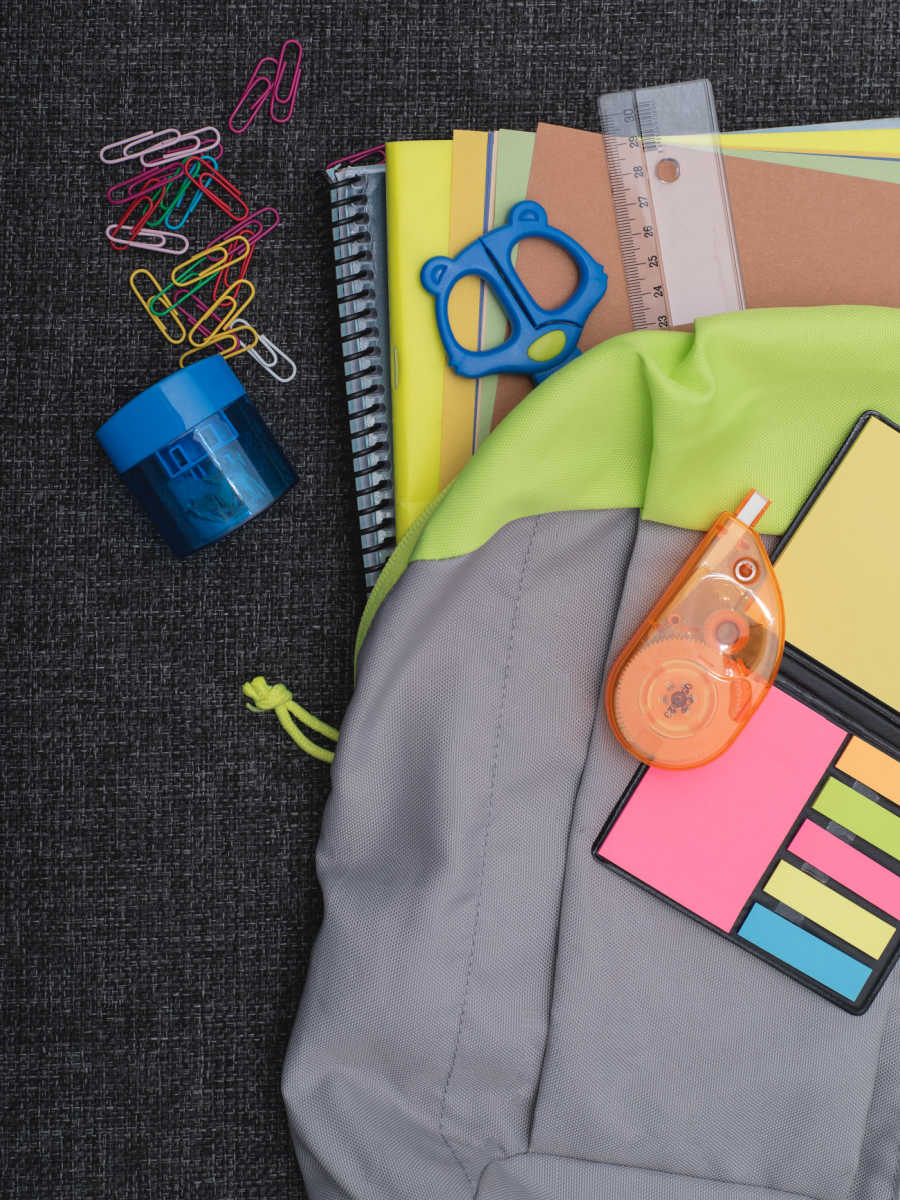 College bag with school supplies