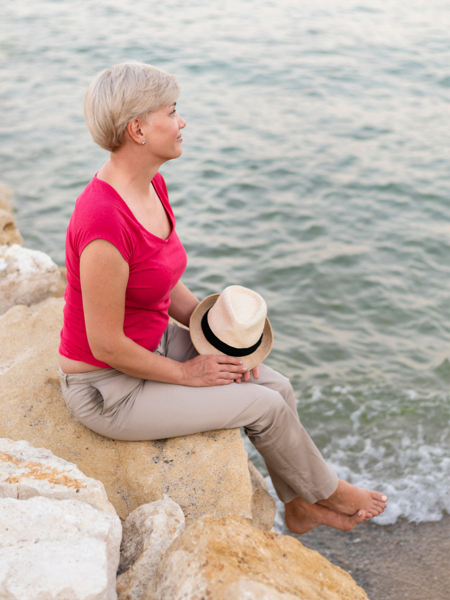 mother enjoying sea view