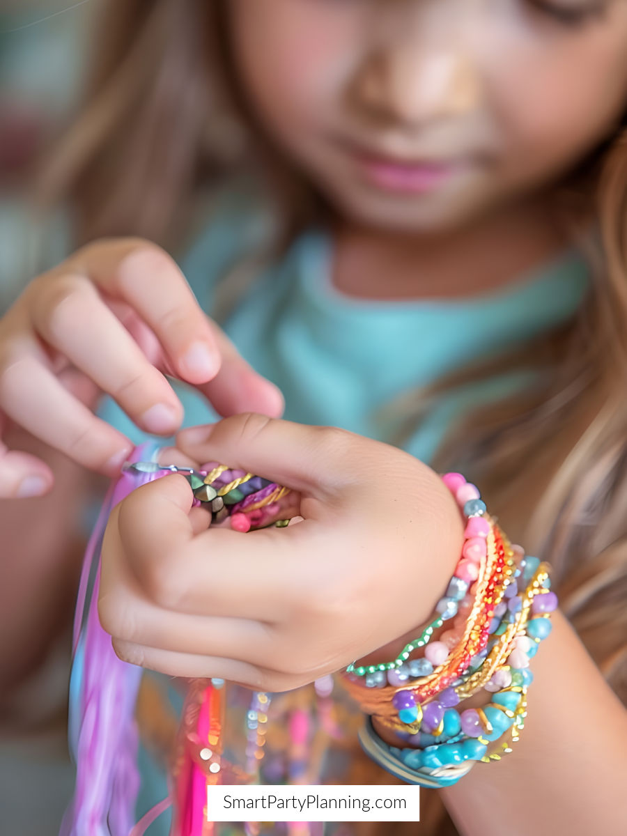 Little girl with her hand made bracelets Little girl with her hand made bracelets